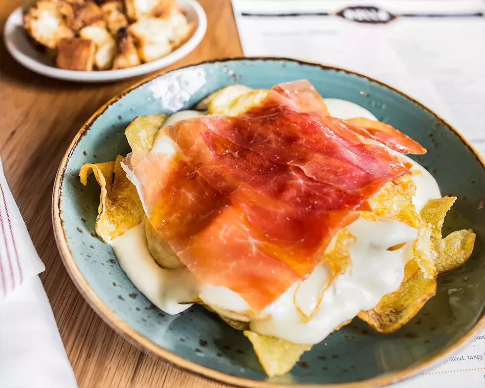 Huevos Bulla: eggs, potato chips, and Serrano ham - PHOTO COURTESY OF BULLA GASTROBAR