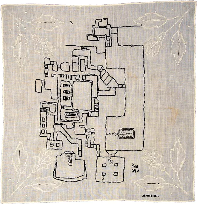 "Love Letters/White Flag: The Book of God (detail)” by Noelle Mason, 2009-2016, hand-embroidered white handkerchiefs