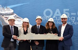 Leaders from Royal Caribbean and Chantiers de l’Atlantique, who are building the new Oasis ship, at the steel cutting ceremony. - IMAGE VIA BERNARD BIGER/CHANTIERS DE L’ATLANTIQUE