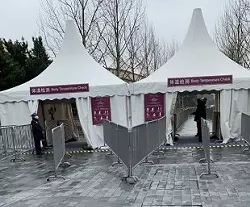 Body temperature checkpoints at the entrance of Shanghai Disneyland's shopping district. - IMAGE VIA GOURMETDDY | TWITTER