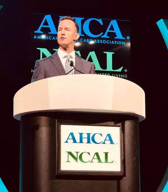 Scott Title speaking at a general meeting in 2018 - AMERICAN HEALTH CARE ASSOCIATION/ NATIONAL CENTER FOR ASSISTED LIVING FACEBOOK