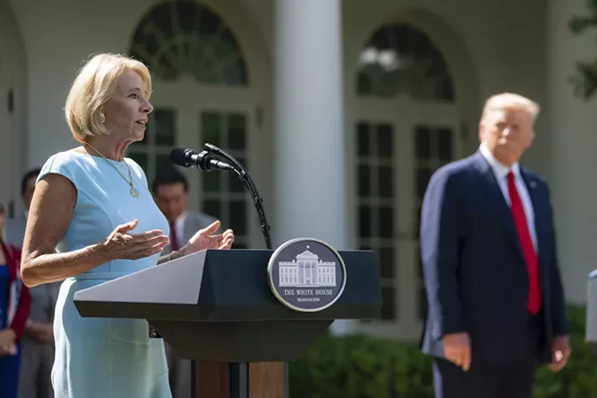 BETSY DEVOS AND DONALD TRUMP JULY 9, 2020 - (OFFICIAL WHITE HOUSE PHOTO BY TIA DUFOUR)