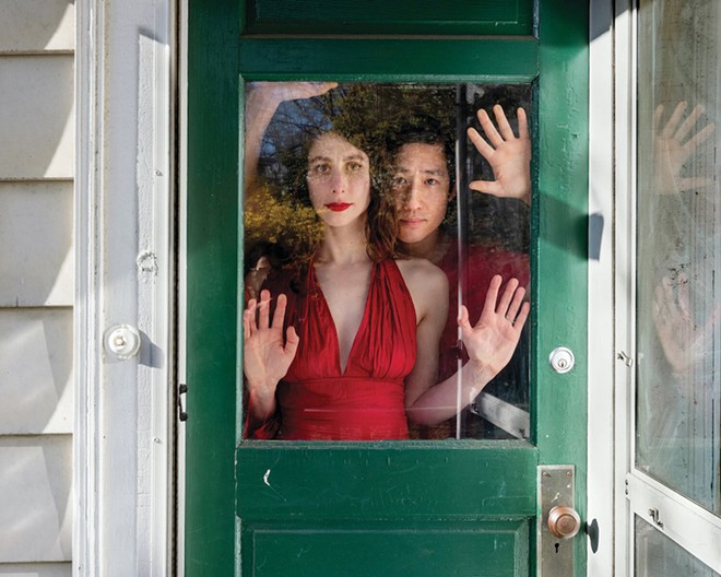 'Mia and Jun, Allston Massachusetts, 2020.'From 'Rania Matar: On Either Side of the Window, Portraits During COVID-19,' at Cornell Fine Arts Museum through May 9, 2021 - PHOTOGRAPH COPYRIGHT RANIA MATAR, ARCHIVAL PIGMENT PRINT ON BARYTA PAPER, IMAGE COURTESY OF THE ARTIST