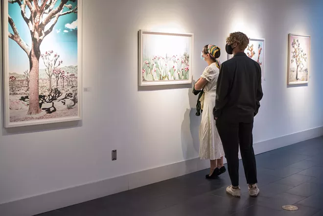 Attendees at Snap Orlando's 'Summer Hues' exhibit opening - ART BY KRISTIN HART. PHOTO BY EMILY JOURDAN FOR SNAP ORLANDO.