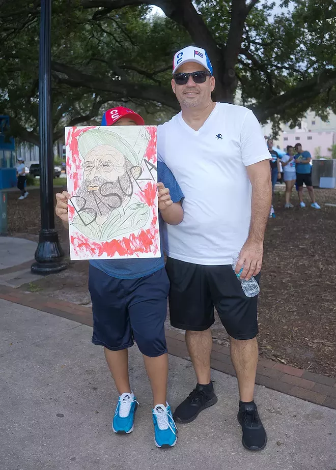 SOS Cuba protesters at Lake Eola Park on Saturday, July 18 - PHOTO BY CRUMMY GUMMY