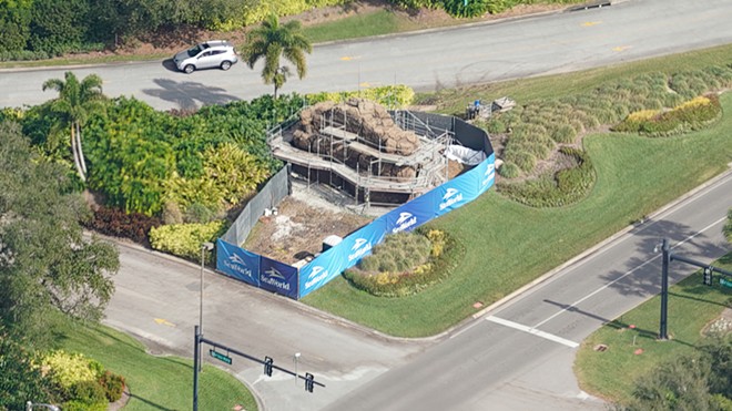 SeaWorld Orlando's new rockwork style entrance sign can be seen under construction in this aerial photo taken in mid-December. - IMAGE VIA BIORECONSTRUCT | TWITTER