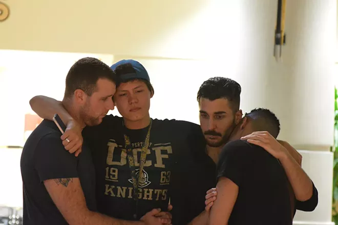 UCF students at a vigil in the Student Union a week after the shootings - PHOTO BY MONIVETTE CORDEIRO
