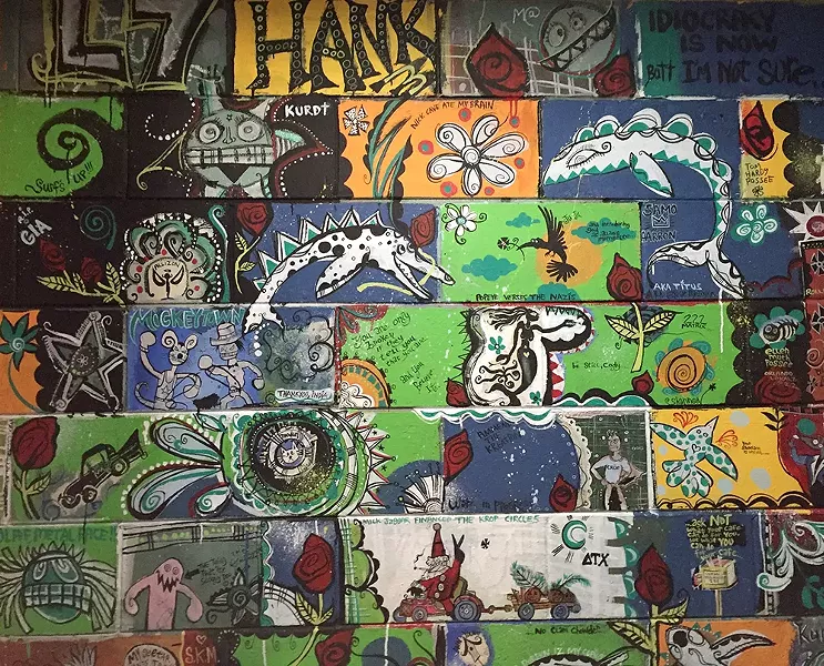The men’s room at Austin’s Coffee, - as customized by Steele