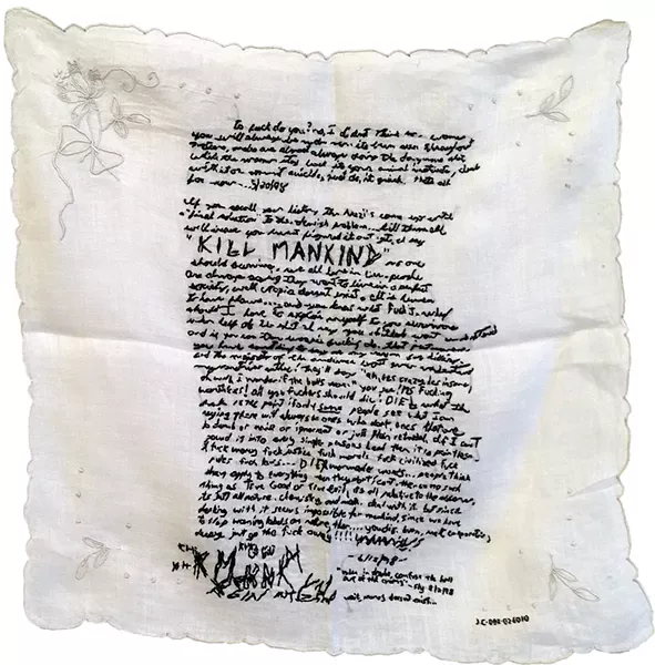 “Love Letters/White Flag: The Book of God (detail)” by Noelle Mason, 2009-2016, hand-embroidered white handkerchief
