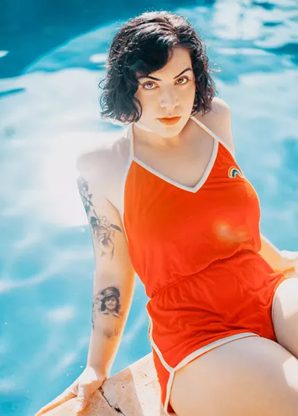 DANI ORMONDE GIVES US LIFE IN A RED ROMPER.PHOTO BY NORREL BLAIR