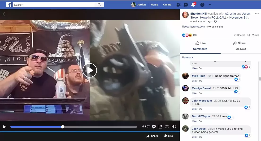 Chris Hill, then leader of the III% Security Force militia network, speaks on Facebook Live in June as Bill Hartwell points a rifle at the camera. - SCREENGRAB VIA JORDAN GREEN/TRIAD CITY BEAT