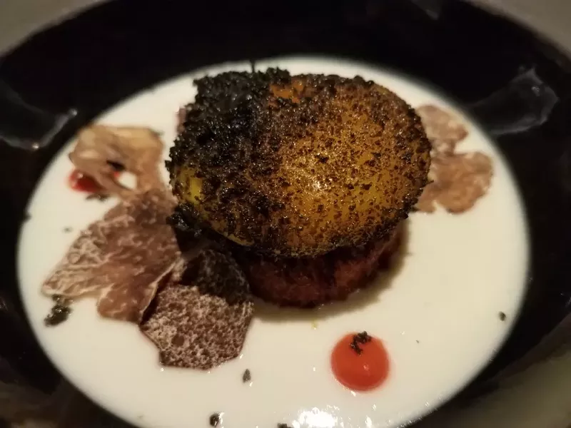 Fried egg yolk with white truffles at Ravello's annual White Truffle Dinner - PHOTO BY FAIYAZ KARA