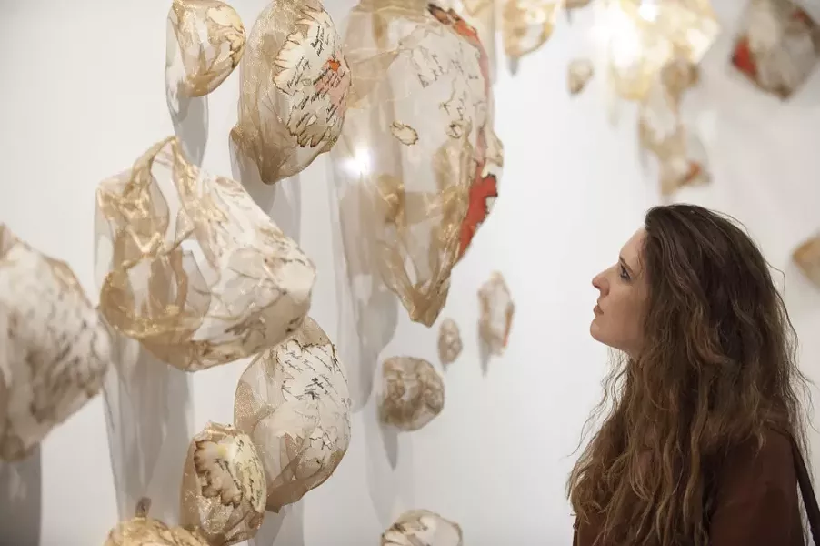 “Invisible Cities” (detail) dimensions variable; copper mesh, dyed and burned Japanese paper, ink - PHOTO COURTESY OF MIRA LEHR