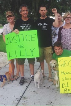 Winter Park residents protest in front of dog shooter's home
