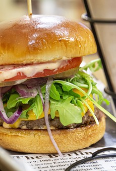 StreetWise Urban Food's sweet plantain burger: cheddar cheese, plantains, arugula, tomatoes, pickles, pickled onions, mayo-ketchup, brioche bun