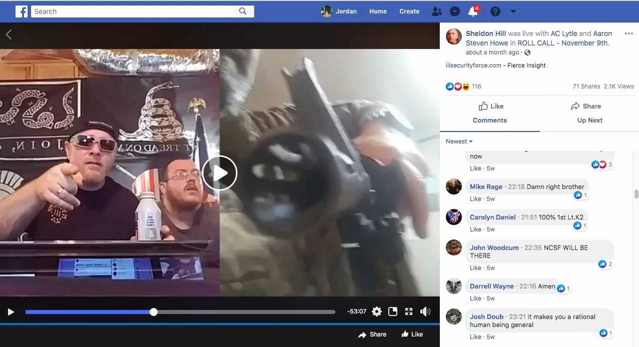 Chris Hill, then leader of the III% Security Force militia network, speaks on Facebook Live in June as Bill Hartwell points a rifle at the camera. - SCREENGRAB VIA JORDAN GREEN/TRIAD CITY BEAT