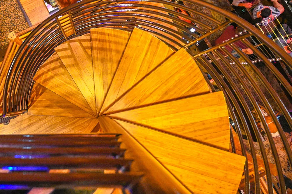 Spiral stairs lead to two balconies. - PHOTO BY JIM LEATHERMAN