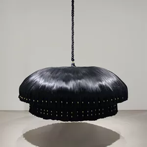 Merryn Omotayo Alaka and Sam Fresquez, Double Take, 2021. Kanekalon hair clips and braids, steel, wire, 81 Ã 59 Ã 59 inches. - LISA SETTE GALLERY