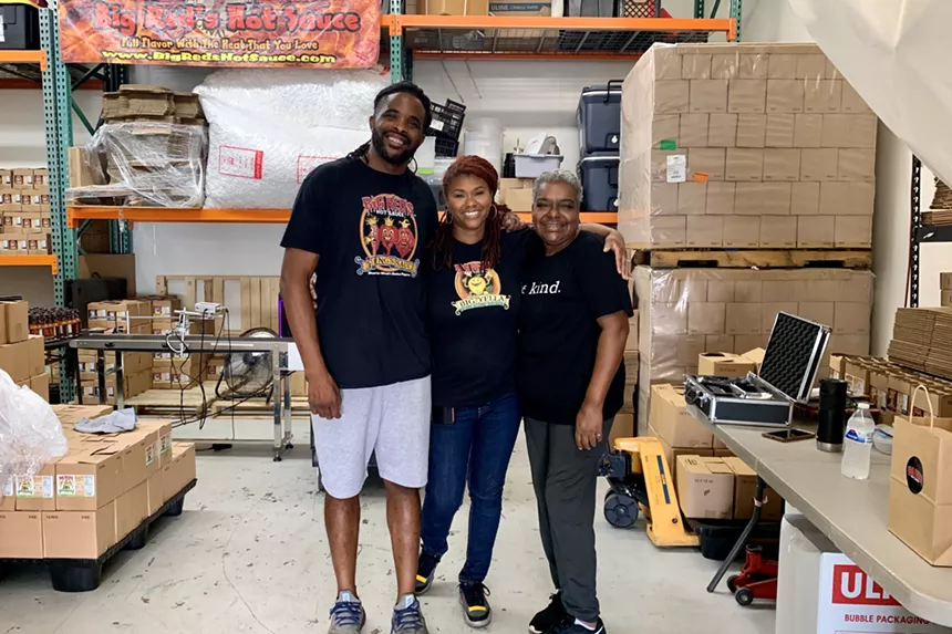 The team putting together orders in the warehouse. Paul Ford, Tasia Ford, Fonda Hooks-Blackmon - BAHAR ANOOSHAHR