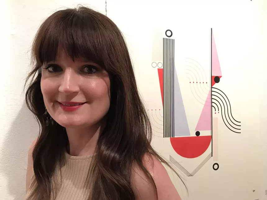 Danielle Hacche with work featured in a previous exhibit at Modified Arts. - LYNN TRIMBLE