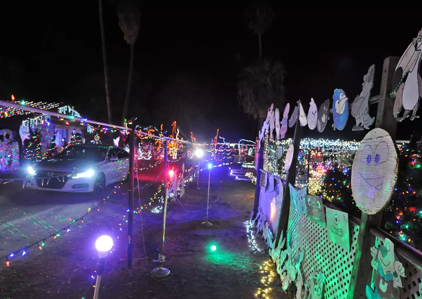 Miracle on 34th Street in north Phoenix is loaded with lights. - JAMES MACGREGOR
