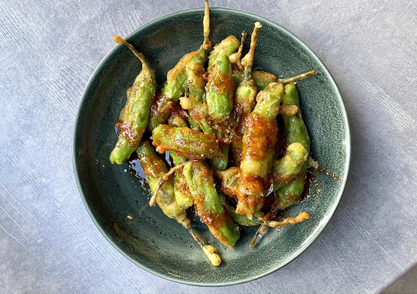 Happy Hour Tempura Fried Shishito Peppers keep your fingers busy and saucy. - ALLISON YOUNG