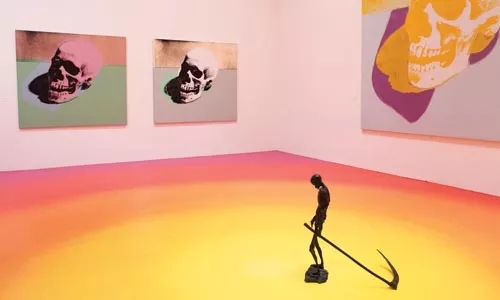 A bronze sculpture by Robert Davis and Michael Langois, and paintings by Andy Warhol, occupies one gallery in The End.