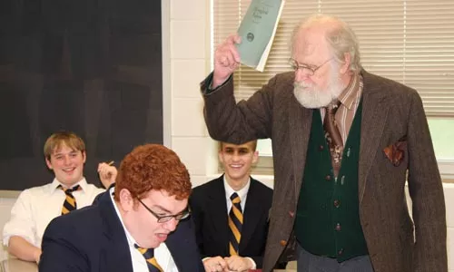 All class: Corey O'Conner (foreground), Bill Bennett (at right) and Troy Bruchwalski and Danny Bradley in Little Lake's The History Boys. - PHOTO COURTESY OF JAMES ORR.