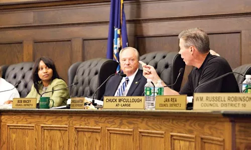 Allegheny County Councilman Chuck McCullough gestures to Councilor Amanda Green while asking council to approve an amendment putting the ordinance to a referendum.