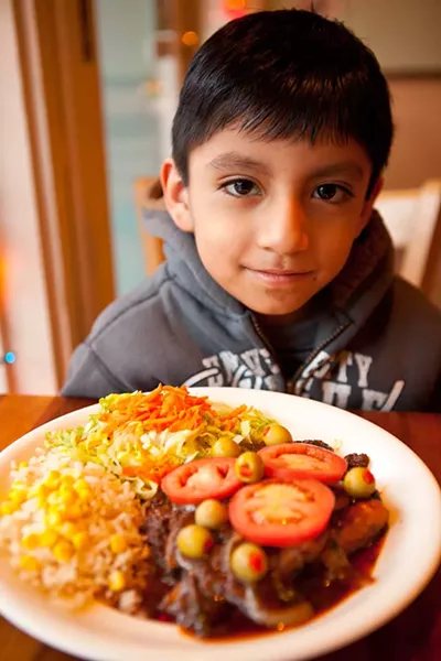 Angel Navarrete with tilapia veracruz - PHOTO BY HEATHER MULL