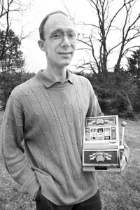 Bruce Barron of No Dice Pennsylvania, with the toy slot machine he uses to demonstrate the device's allure