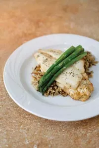 Crab-stuffed flounder with wild rice and asparagus - HEATHER MULL
