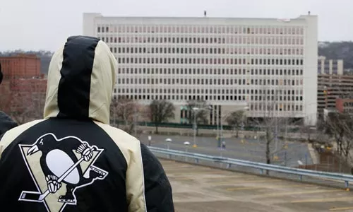 Despite the lack of a CBA with Hill District groups, preparation for a new hockey arena -- such as the implosion of the old St. Francis Hospital -- continues. - HEATHER MULL
