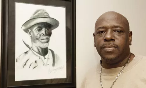 Drawn in: James E. "P-Wee" White and his drawing "The Eagle Hunter" at the Hill District barbershop where he works.