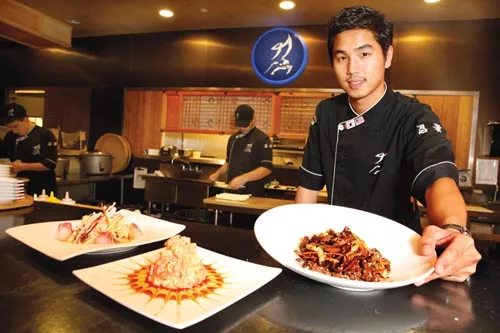 Executive chef Imsub Lee with (from left) tai mika salad, volcano blossom and bulgogi teriyaki - PHOTO BY HEATHER MULL