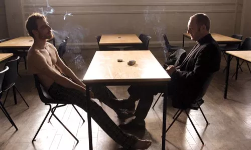Food, not bombs: Bobby Sands (Michael Fassbender) and Father Moran (Liam Cunningham) discuss a hunger strike.