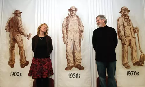 Gallerist Tavia La Follette and her husband (and co-curator) Gary Huck in their exhibit "The Gritty 250" at 820 Liberty Avenue - HEATHER MULL