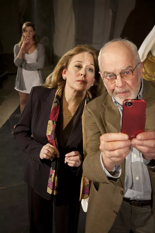 Helena Ruoti and Larry John Meyers, with Melinda Helfrich in the background