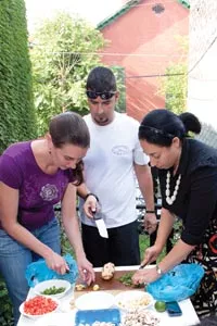 Pamela Reitsma, Jeremy Knapp and Mona Abdel-Halim learn how to cook Indian food during a Communiteach session in Bloomfield. - RENEE ROSENSTEEL