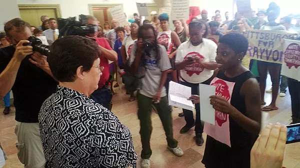 Pittsburgh City Council President Darlene Harris speaks to demonstrators about their concerns after the acquittal of George Zimmerman in the shooting death of Trayvon Martin. - PHOTO BY CHRIS POTTER