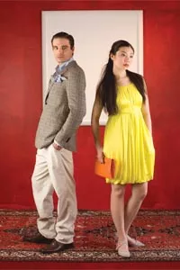Siran wears: yellow Grecian-style dress by Norma Kamali, available at Chick Downtown; orange leather clutch by Hobo International, available at Mia Boutique; flats by Irregular Choice, available at Pavement Shoes. - Brian wears: tan windowpane-check, two-button linen jacket by Etro, light-teal button-down cotton sport shirt by Loro Piana, sisal stretch cotton/linen flat-front trousers by Hiltl, and blue-floral batik linen pocket square by Salvatore Ferragamo; all available at Larrimor's. - HEATHER MULL