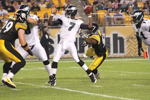 Steelers linebacker James Harrison prepares to sack Philadelphia's Michael Vick. - PHOTO BY HEATHER MULL