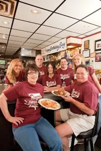 Tell em Guy sent you: Nadine's crew (from left) Kim Aul, Nadine Voelker, Earl Rudis, Peep Meade, - Matt Voelker, Marissa Voelker and Mike Voelker - RENEE ROSENSTEEL