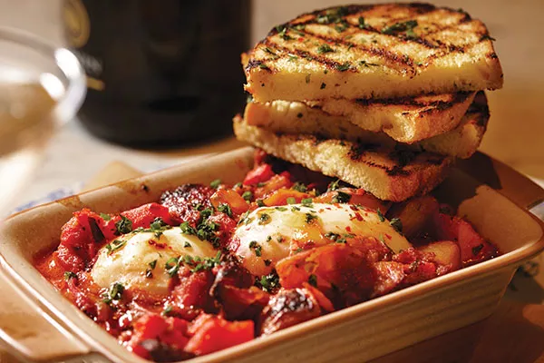The "Mess Beni": chorizo, roasted pepper, onions, stewed tomatoes and poached eggs - PHOTO BY BRIAN KALDORF