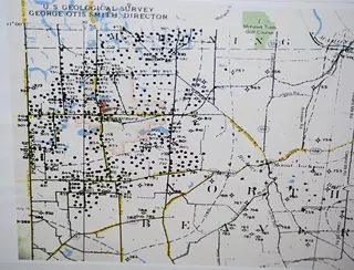 This map shows the area around the Henry Farm. The black dots indicate sites of abandoned oil and gas wells. - PHOTO BY CHARLIE DEITCH