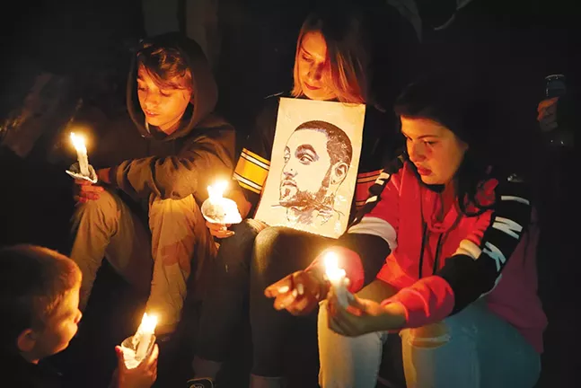 Mac Miller fans at the candlelight vigil in Blue Slide Park on Tue., Sept. 11 - CP PHOTO: JARED WICKERHAM