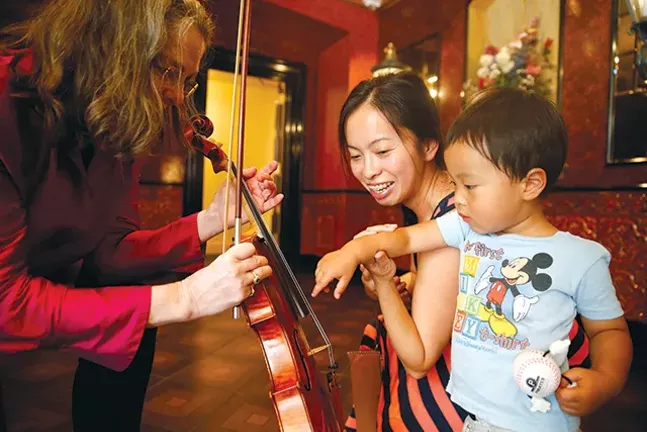 The Pittsburgh Symphony Orchestra participates in a sensory-friendly concert at Heinz Hall. - CP PHOTO: JARED WICKERHAM