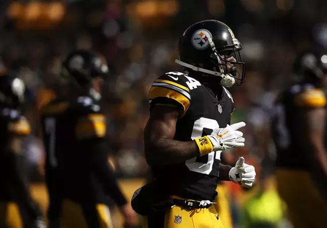 The sun momentarily came out as Antonio Brown jogs to the line of scrimmage. - CP PHOTO: JARED WICKERHAM