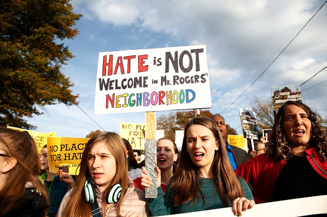 While President Trump was visiting, multiple groups of marchers made their way towards the Tree of Life synagogue three days after a mass shooting in Pittsburgh. - CP PHOTO: JARED WICKERHAM