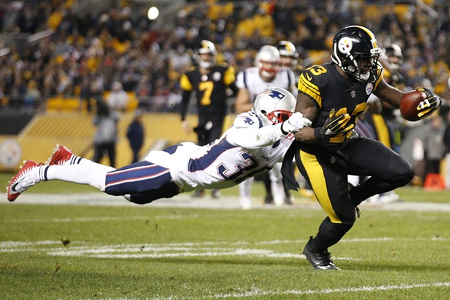 James Washington evades a stretched out Jason McCourty on a catch. - CP PHOTO: JARED WICKERHAM